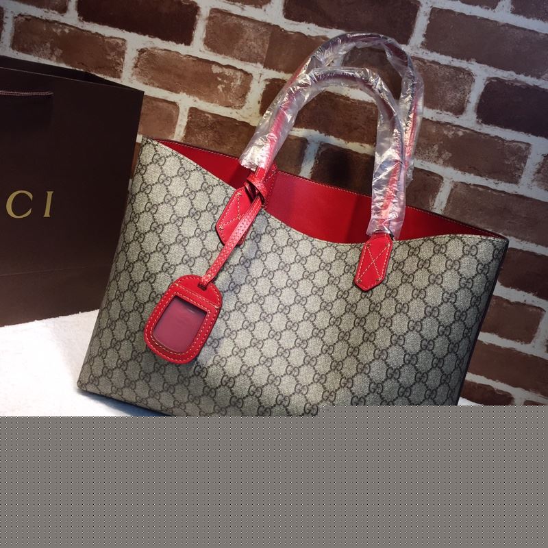 G*u*i shopping bags
